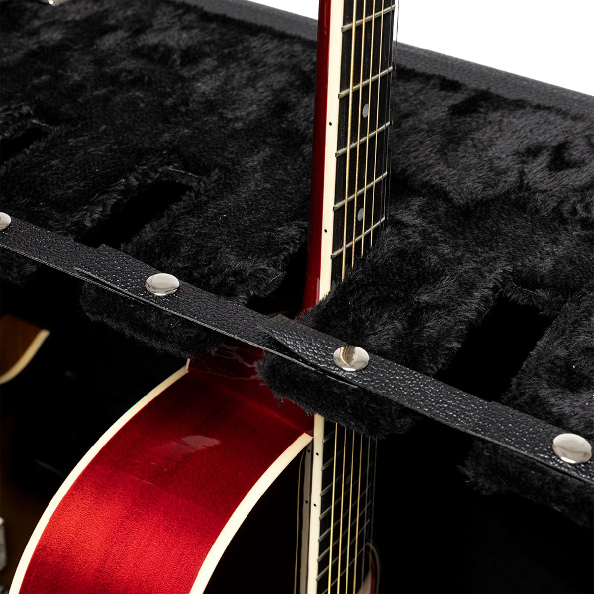 Stagg GDC-6 guitar stand case, close-up of the leather retaining strap holding an acoustic guitar neck