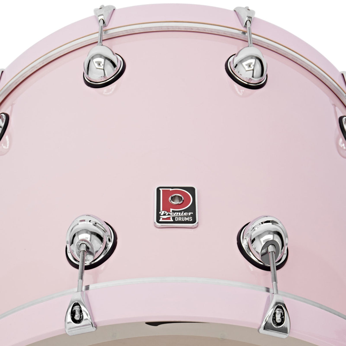 Close-up of the Premier badge and tension lugs on the Pink Genista Maple 22 x 18 bass drum