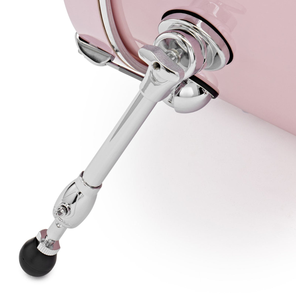 Close-up of the bass drum spur and rubber foot on the Pink Premier Genista Maple bass drum