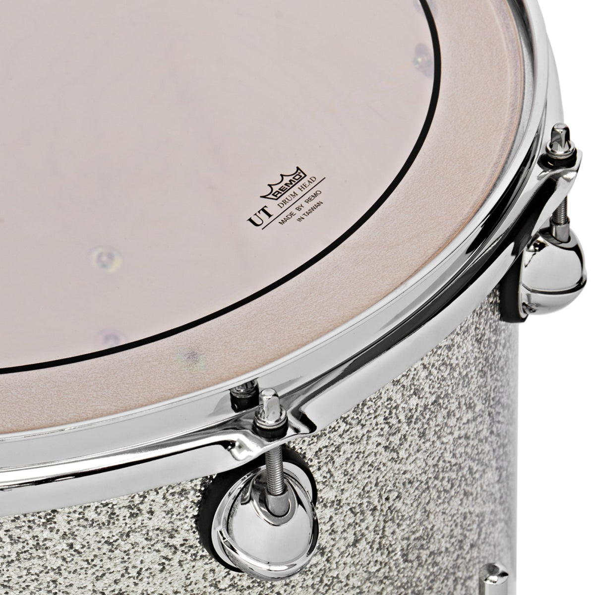 Close-up of the Remo Pinstripe UT drumhead and chrome hoop on a Silver Sparkle Premier Genista Maple tom