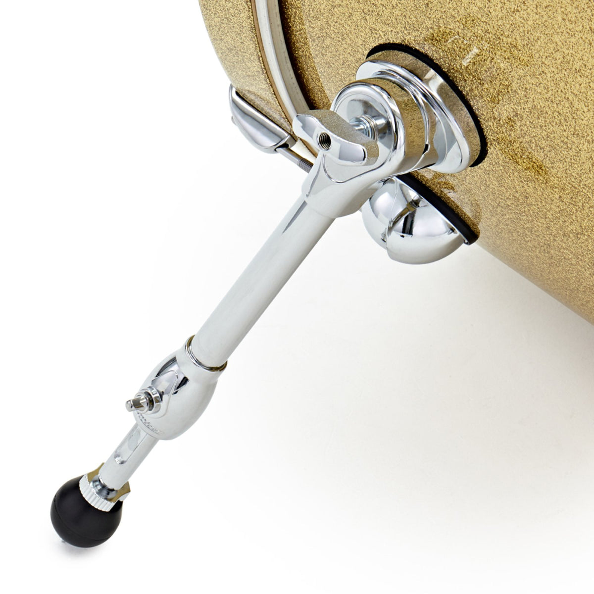 Close-up of the bass drum spur and rubber foot on the Vintage Gold Sparkle Premier Genista Heritage bass drum
