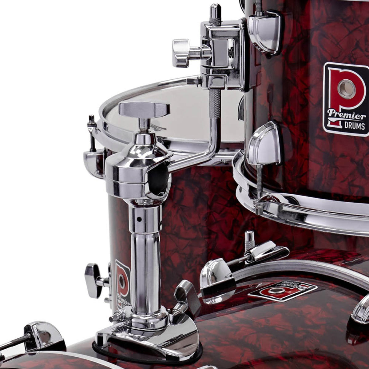 Close-up of the tom mount and bass drum hoop on the Premier Artist Heritage 18-inch 4-piece shell pack in Burgundy Pearl
