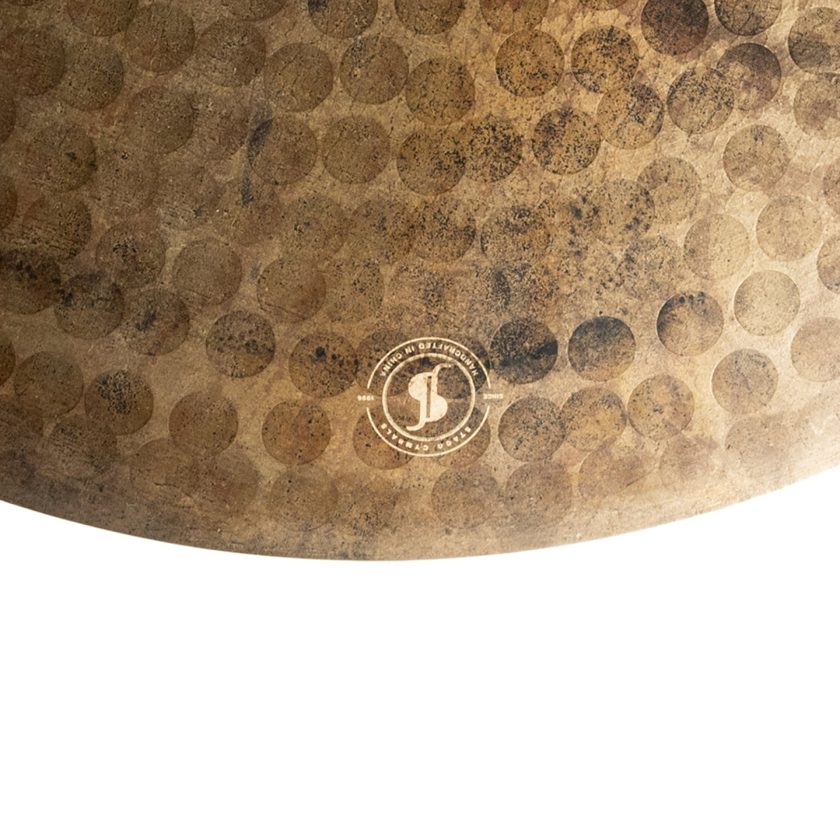 Close-up of the hammered surface and Stagg stamp on the Stagg MYRA Raw 21-inch ride cymbal