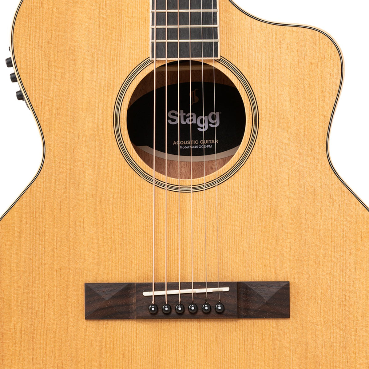 Close-up of the soundhole, cutaway and rosewood bridge on the Stagg SA45 OCE-FM guitar