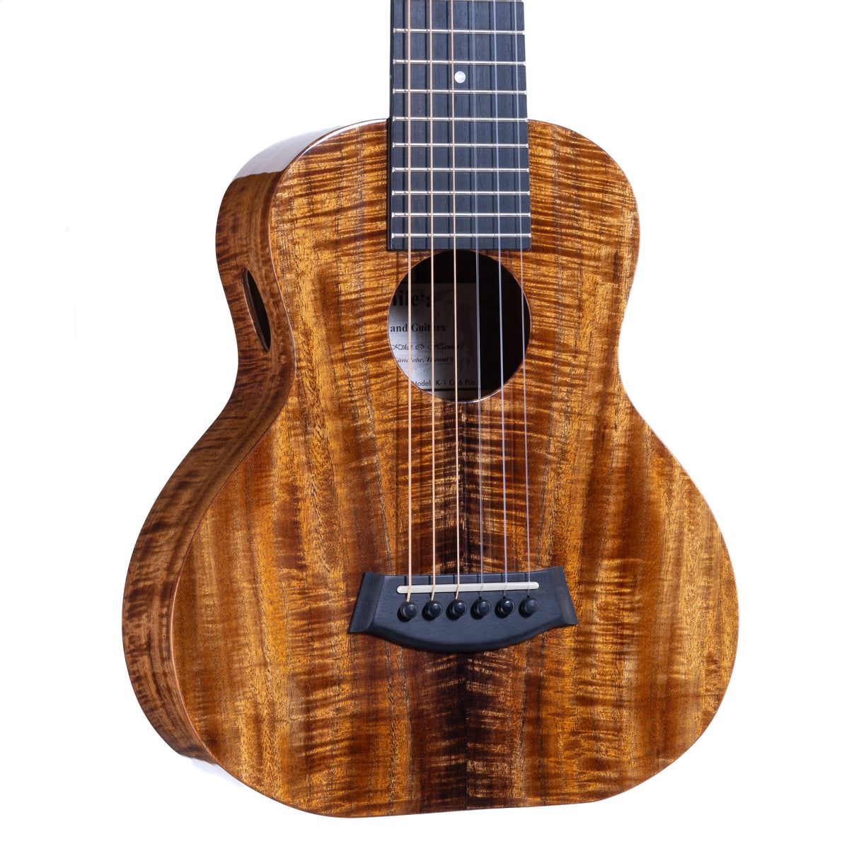 Close-up of the figured Hawaiian koa top, round soundhole and ebony bridge on Kanile'a K-1 GL6 Pro guitarlele, serial 30199