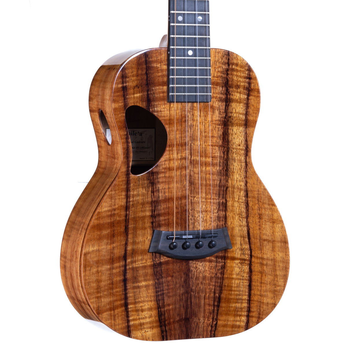 Close-up of the Hawaiian koa top, ebony bridge and D-shaped soundhole on Kanile'a D-1 Pro 6-string tenor ukulele, serial 30091