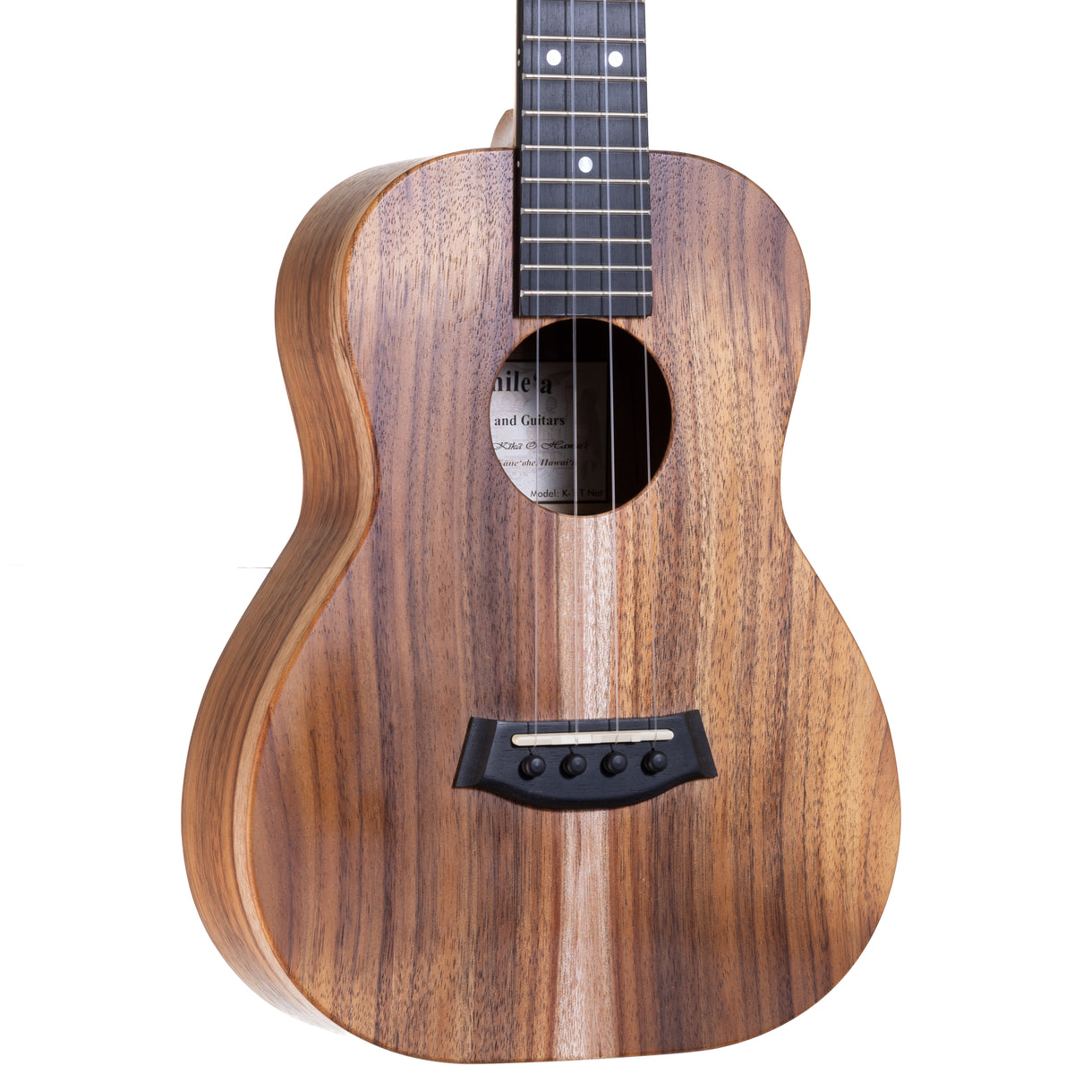 Close-up of the koa top, ebony bridge and traditional soundhole on Kanile'a K-1 Natural tenor ukulele, serial 29971