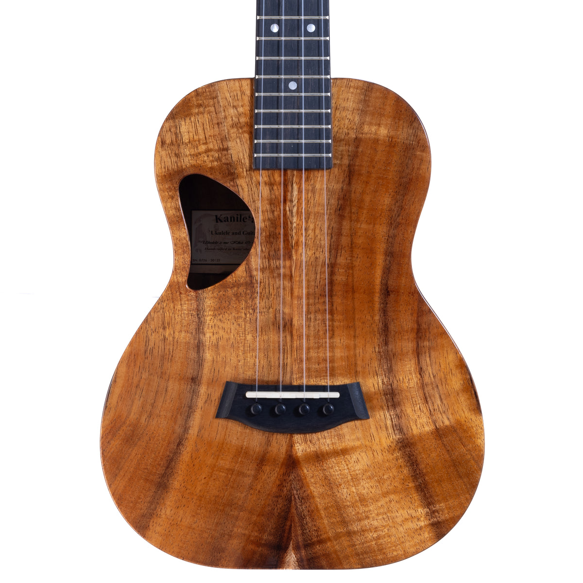 Upper bout of Kanile'a D-1 Deluxe tenor ukulele serial 30132 showing the koa top grain