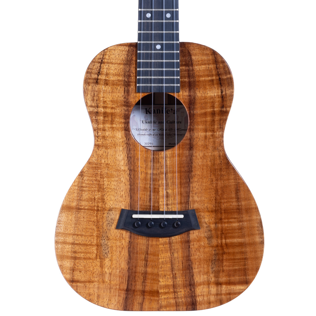 Upper bout of Kanile'a K-1 tenor ukulele serial 30298 showing koa top grain and the Kanile'a label inside the soundhole