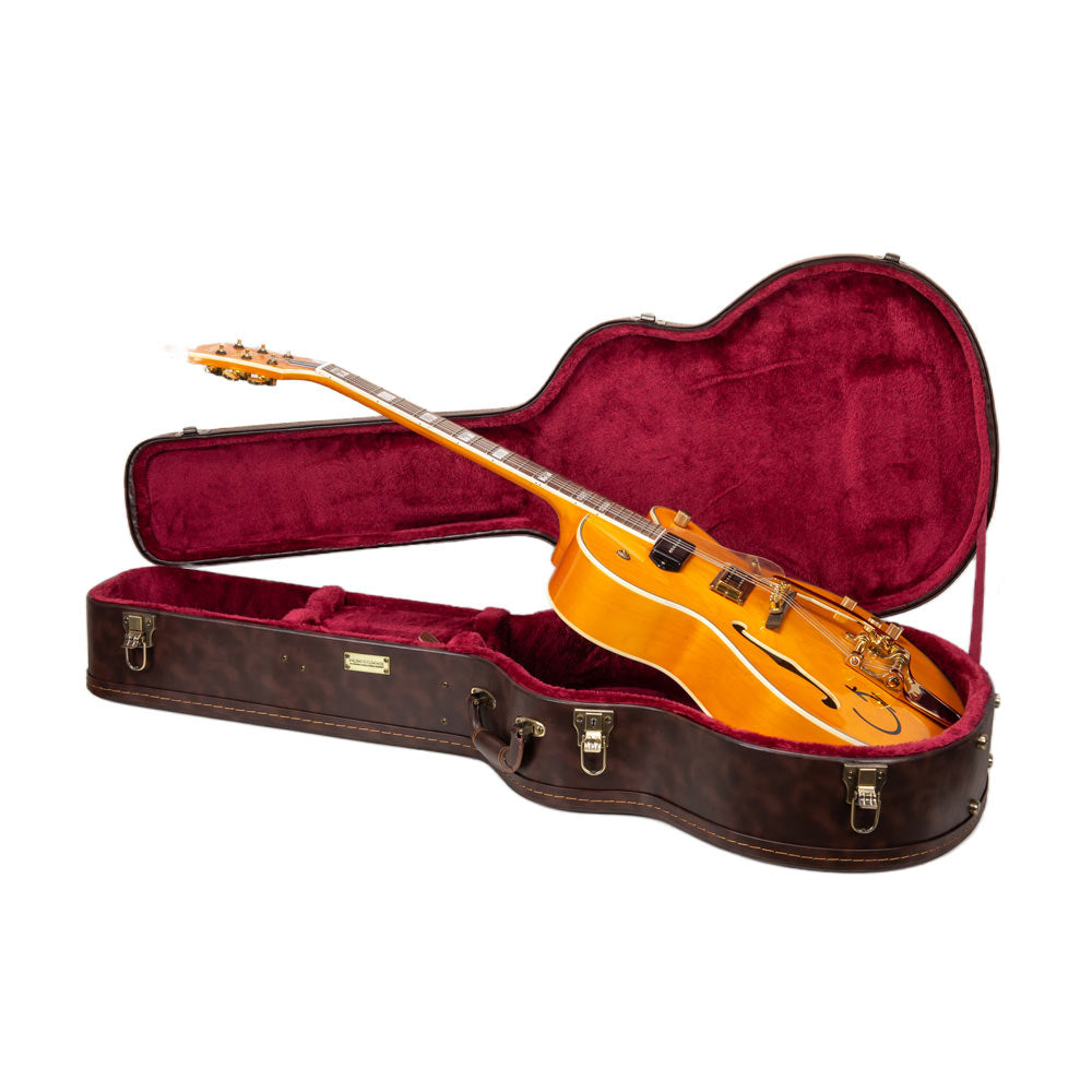 Hollowbody archtop jazz guitar resting in open Crossrock CRW620JA16 brown case