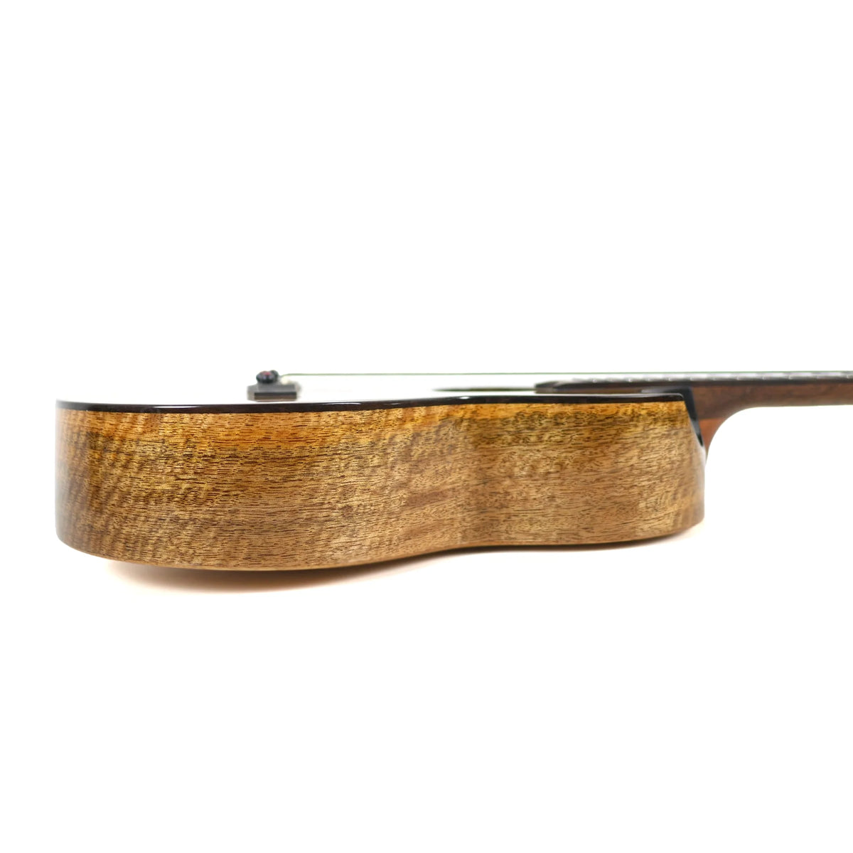 Side profile of the Flight Fireball EQ-A, showing the mango sides, black binding and the cutaway (ukulele #7)