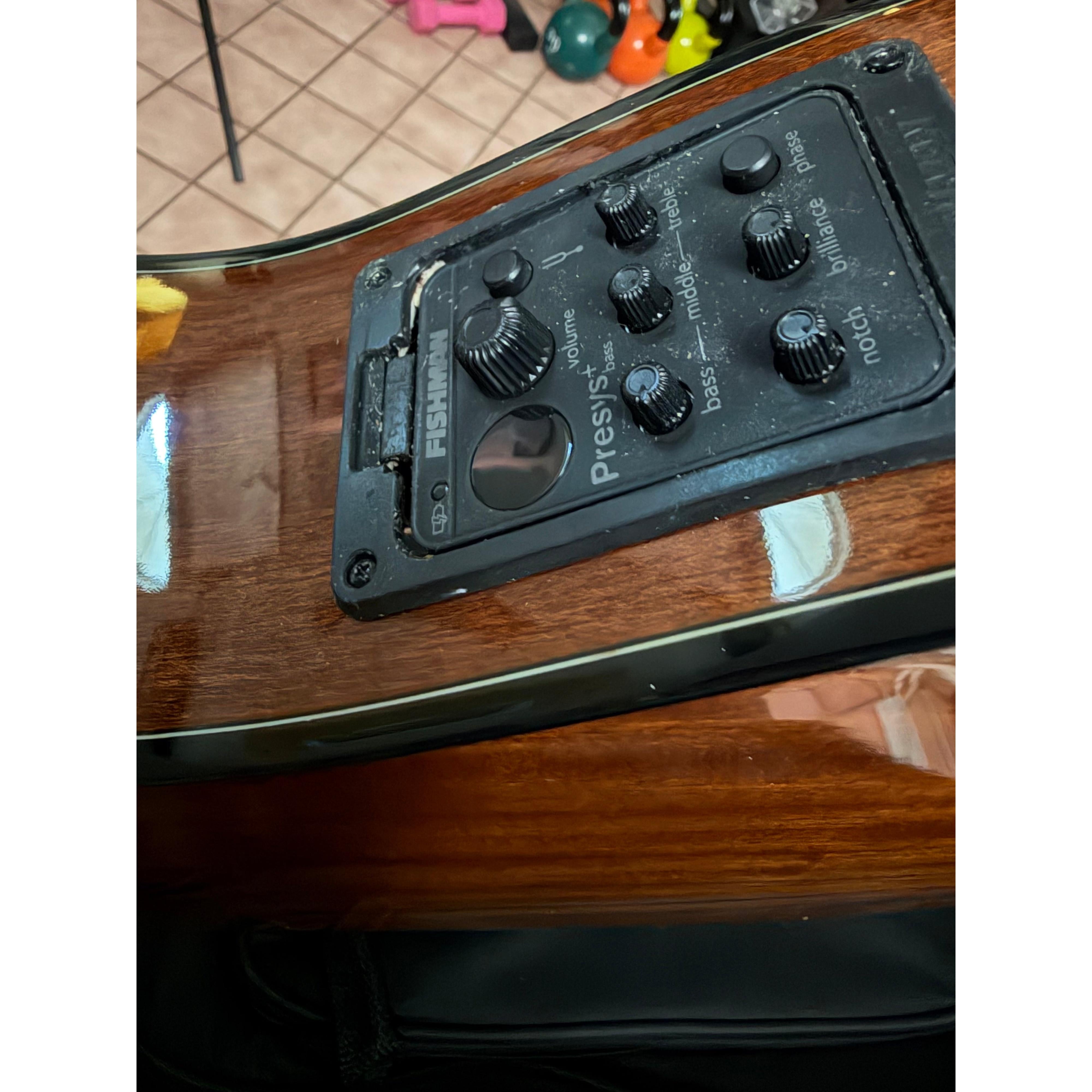 Second close view of the OBU-22 preamp panel, showing the damaged housing edge beside the battery drawer