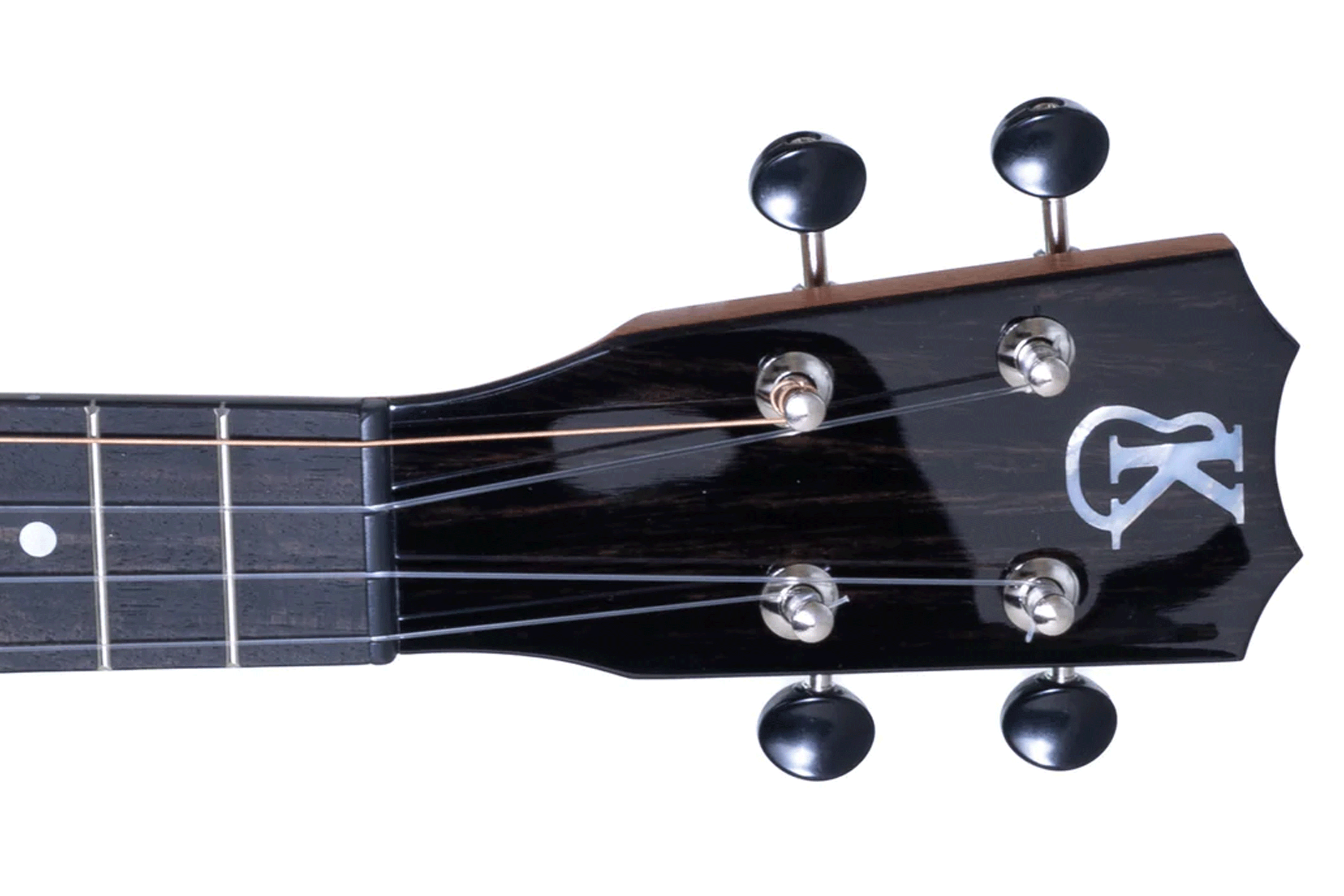 Close-up of a ukulele headstock with tuning pegs on a white background