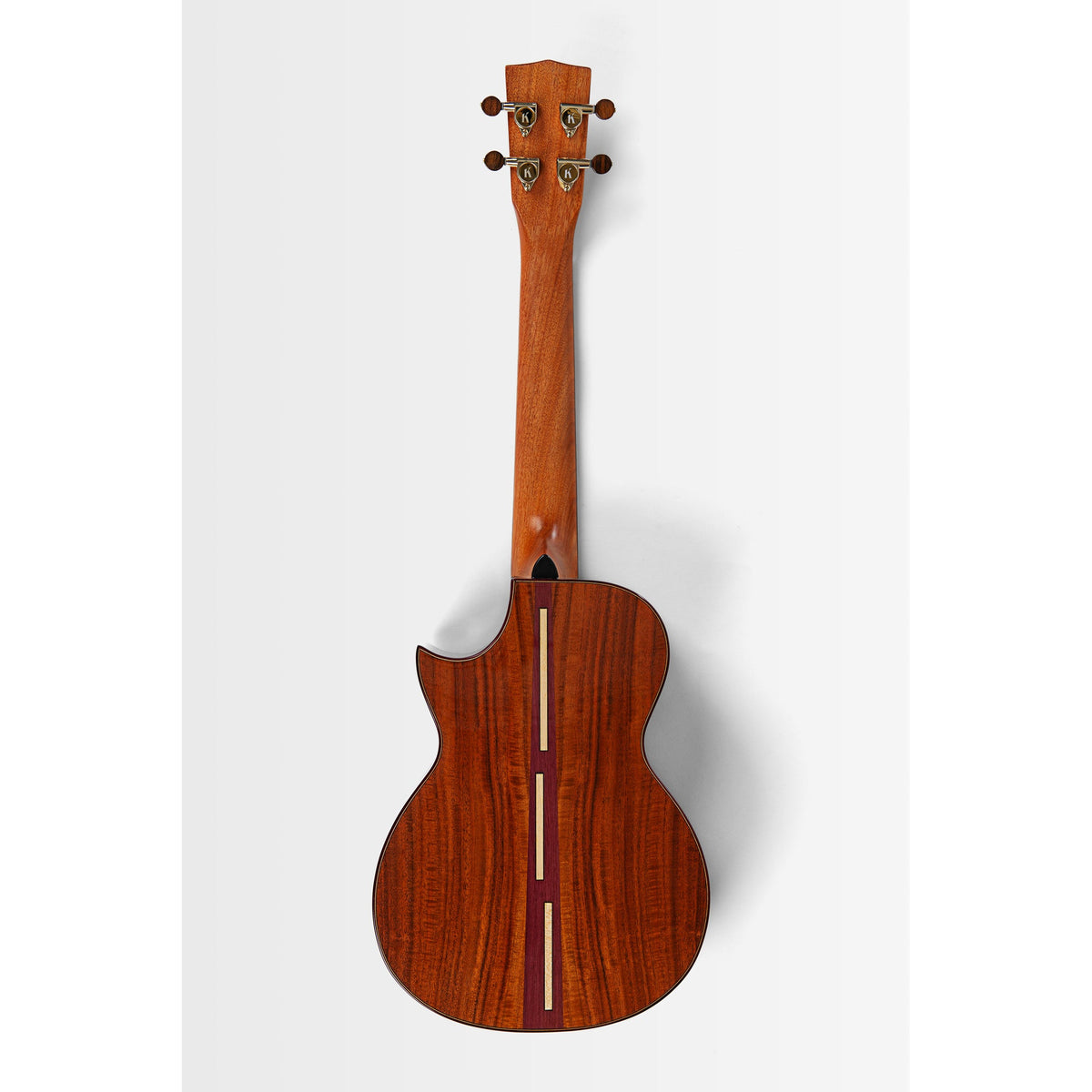 Back of the Kala KA-3CD-ACA-T showing the figured solid acacia back and three cord backstrip