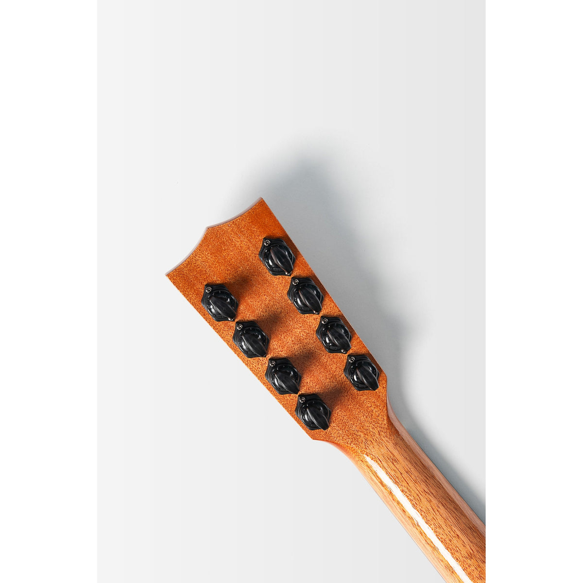 Back of the Kala Taro Patch headstock showing the eight tuners