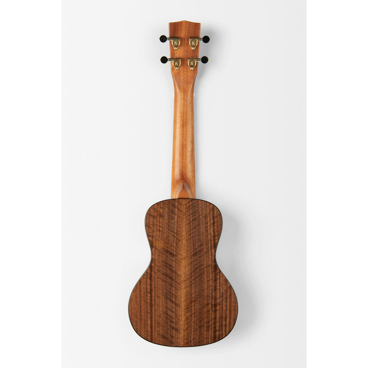 Back of the Kala KA-WCW-BMP-C showing the solid walnut back and mahogany neck