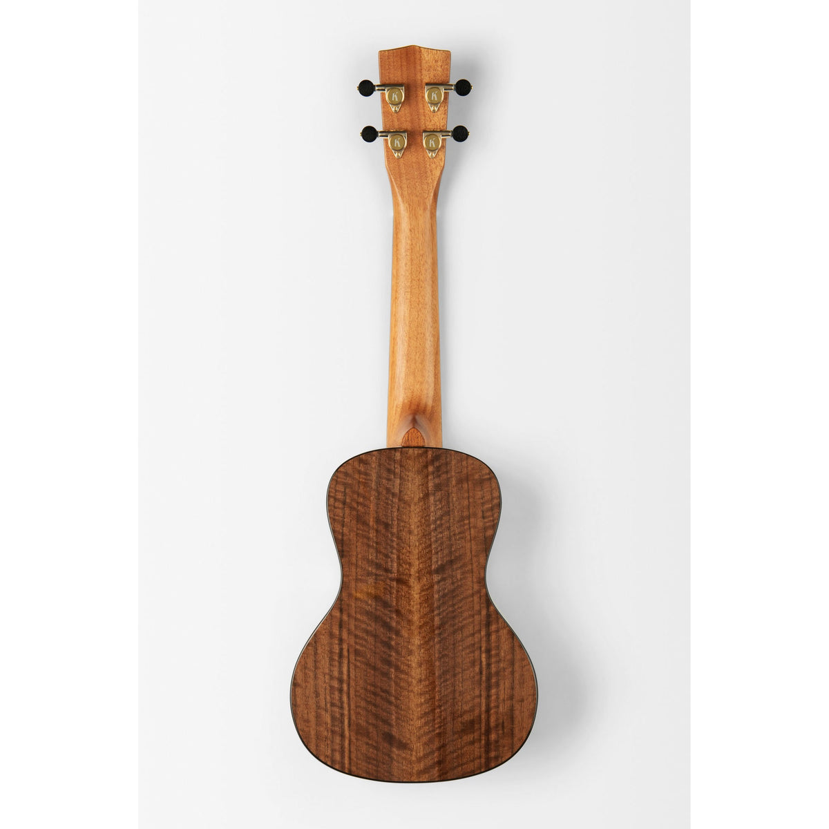 Back of the Kala KA-WCW-MYR-C showing the solid walnut back and mahogany neck