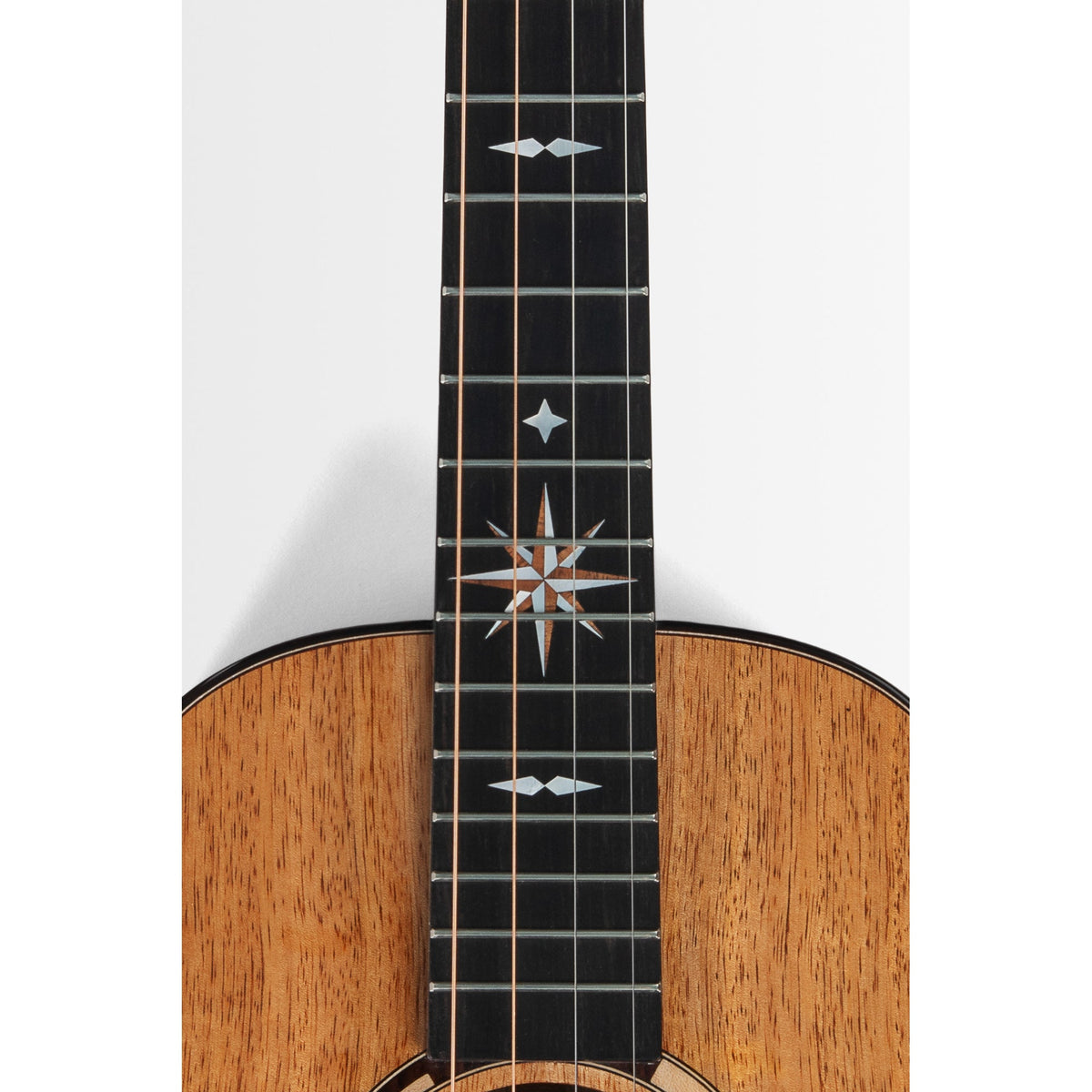 Ebony fingerboard of the Kala KA-WP-MNG-GB-E with compass star inlay