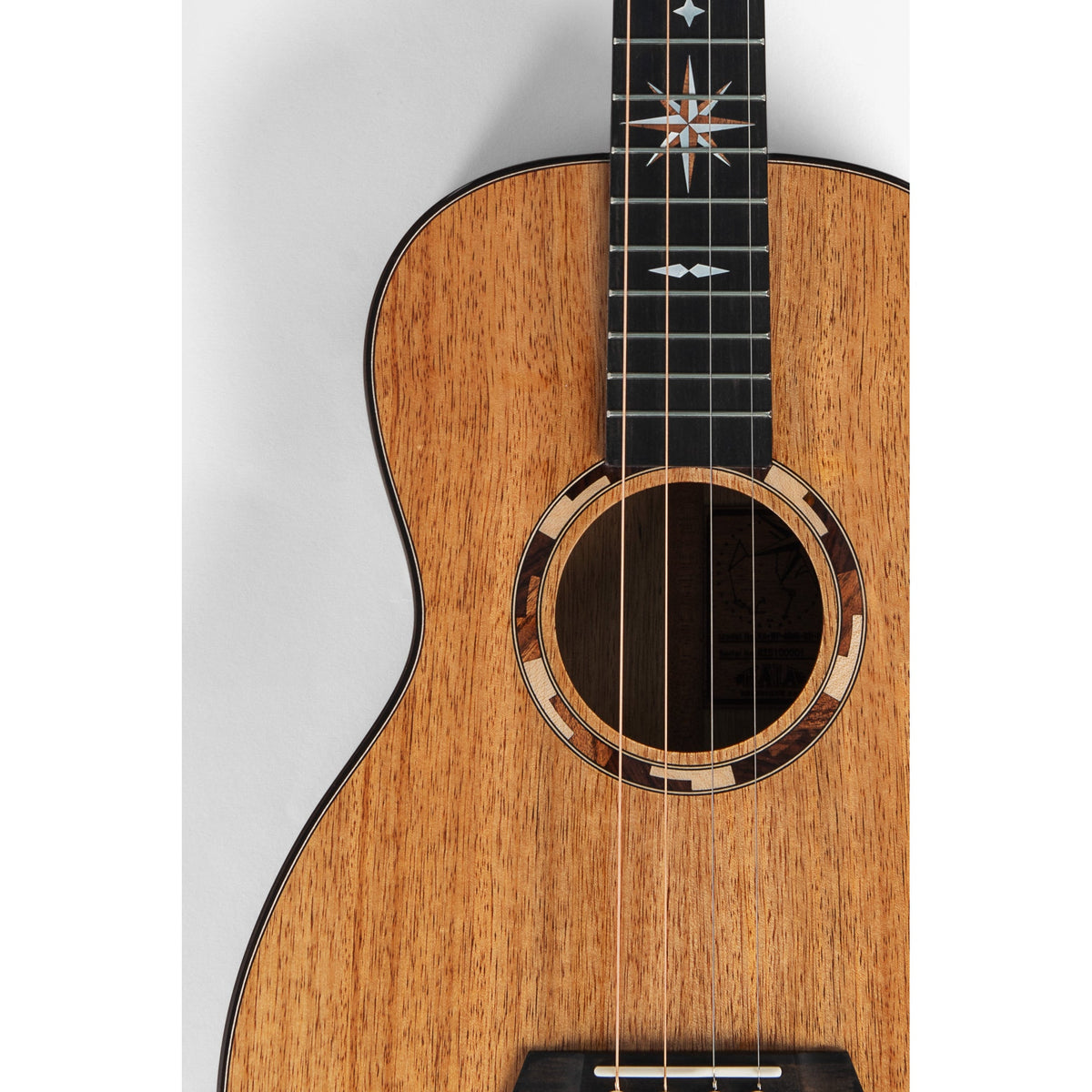 Kala KA-WP-MNG-GB-E body front close-up, solid golden mango top with acacia, maple and rosewood rosette