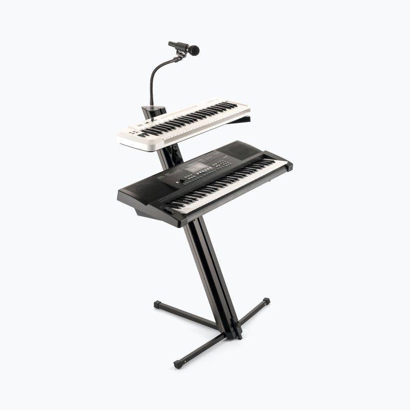 On-Stage KS9102 column stand holding two keyboards with a gooseneck mic on top
