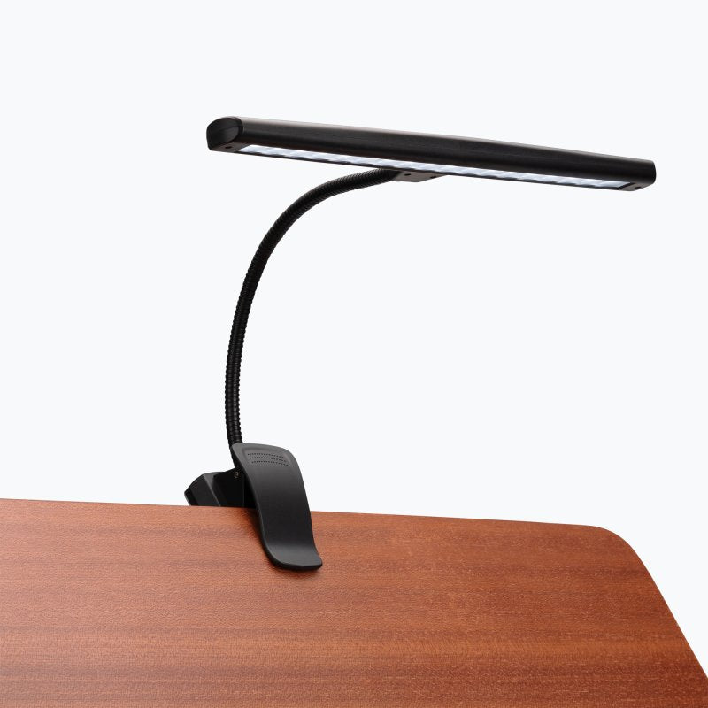 On-Stage LED518 orchestra light clipped to the edge of a wooden music stand
