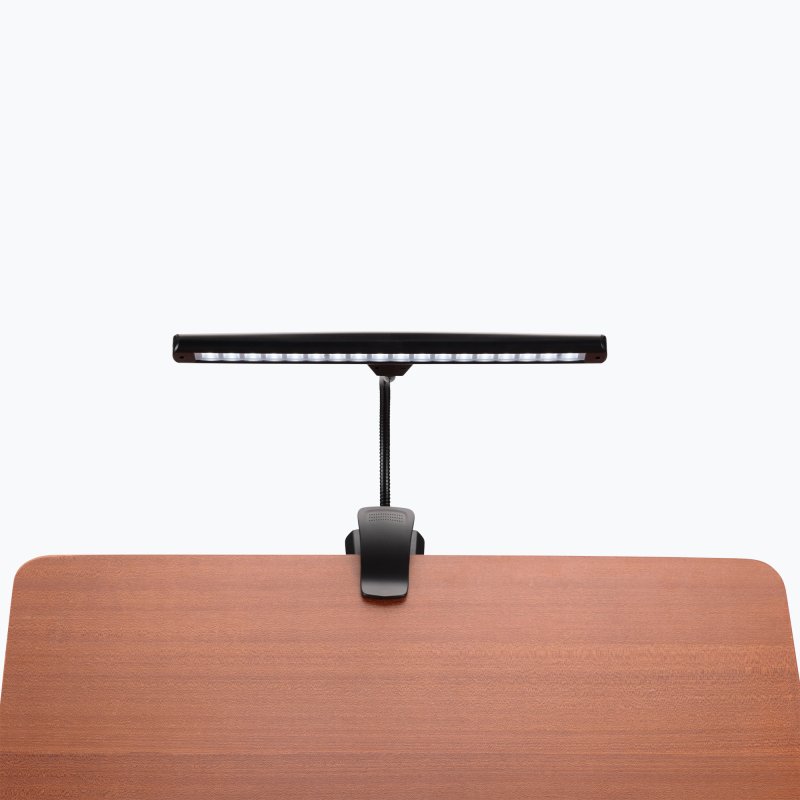 On-Stage LED518 wide lamp head lit, clipped to a music stand