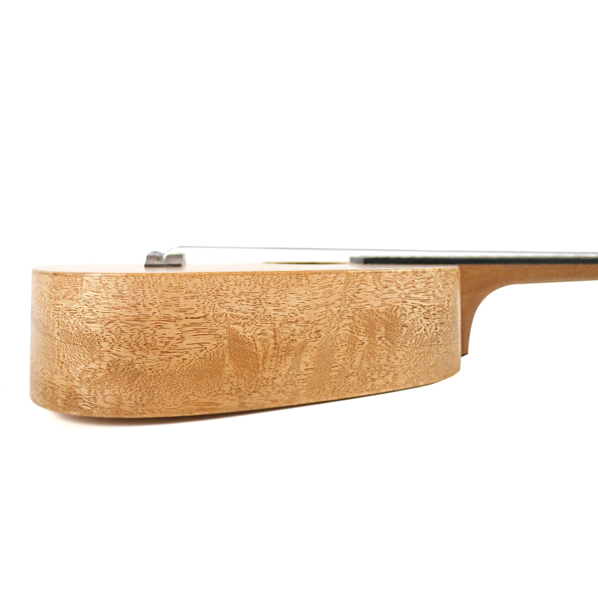 Side profile shows the solid mango sides, satin finish, and mahogany neck.