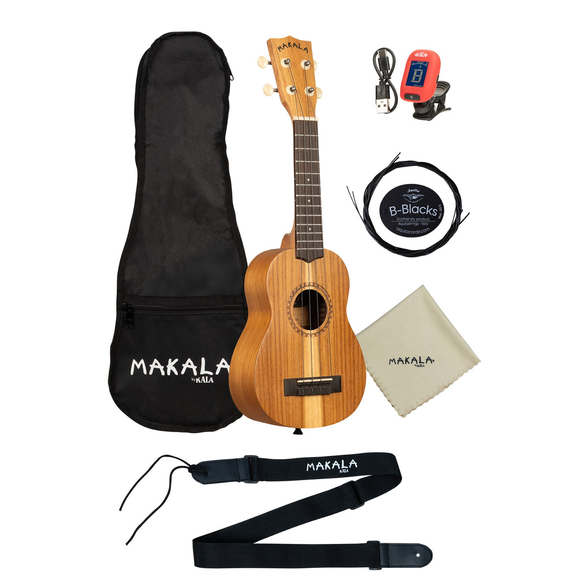 Makala MK-S-IA-PACK contents laid out: ukulele, gig bag, Klipz tuner, strap, strings and polish cloth