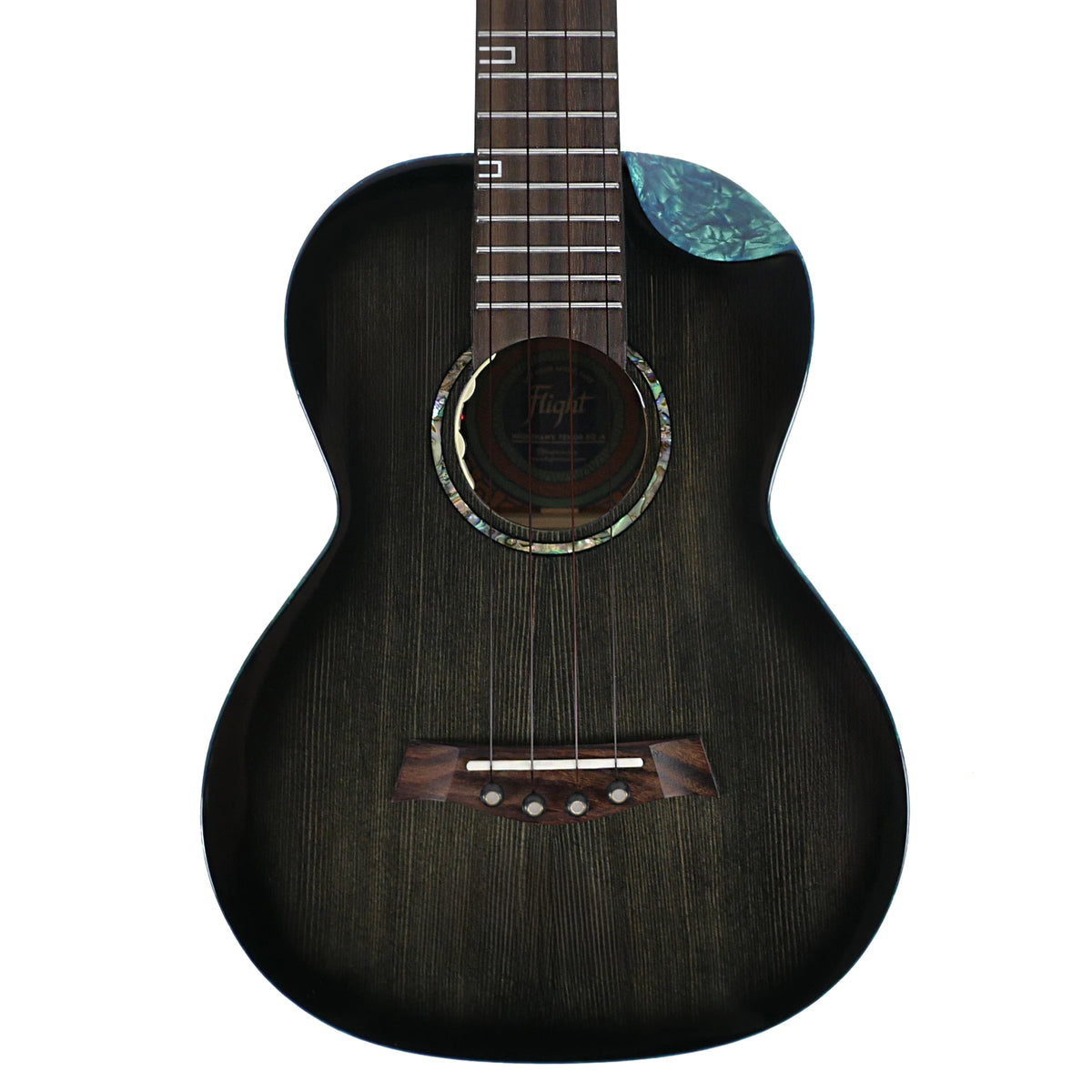 The close-up highlights the solid spruce top, white pearloid rosette, and scalloped blue pearloid cutaway of the Flight Nighthawk Tenor.