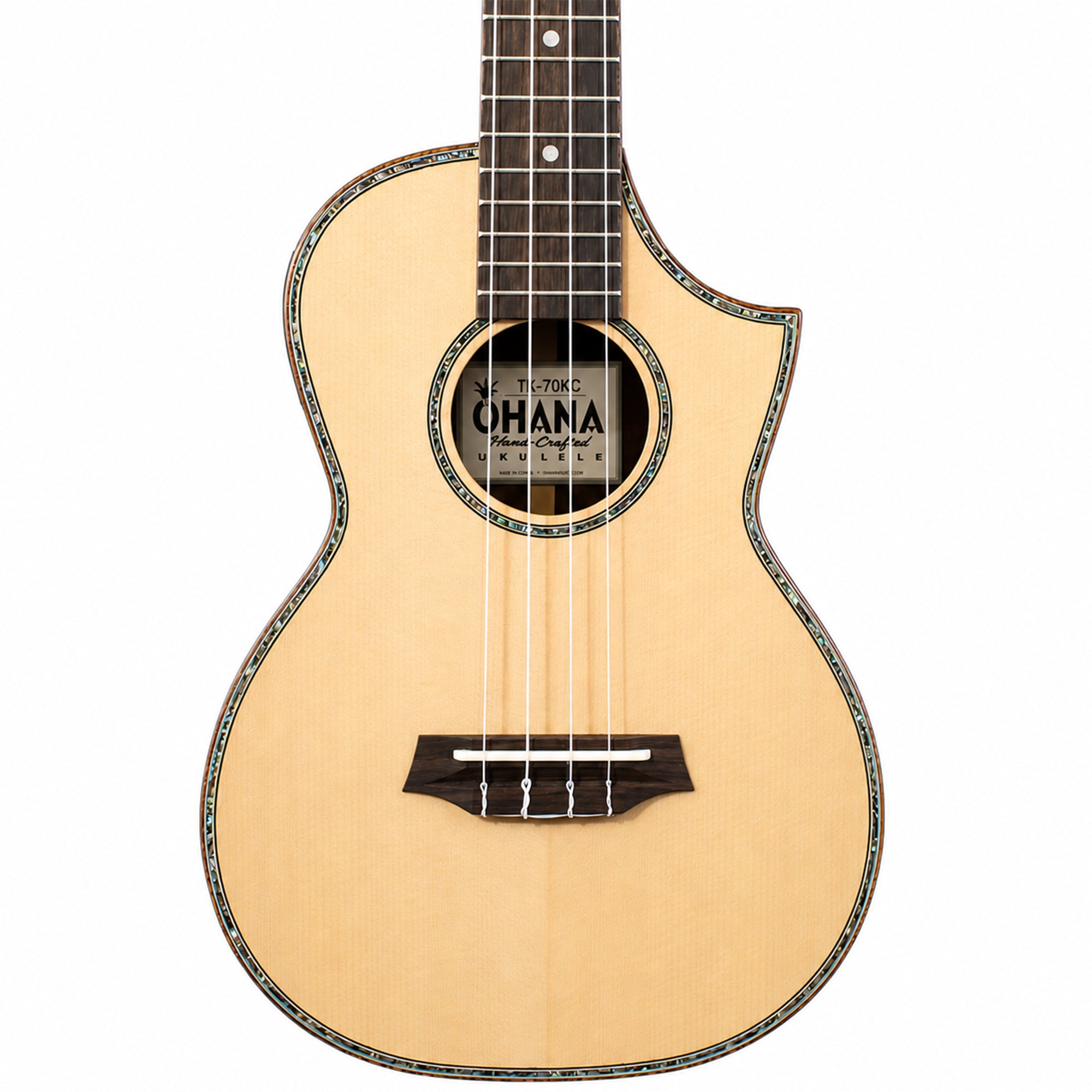 A Ohana TK-70KC Limited Edition Tenor Ukulele with a natural wood finish and black rosette detailing, shown from the front against a white background. The brand 'Hermanaohana' is visible on the sound hole label.