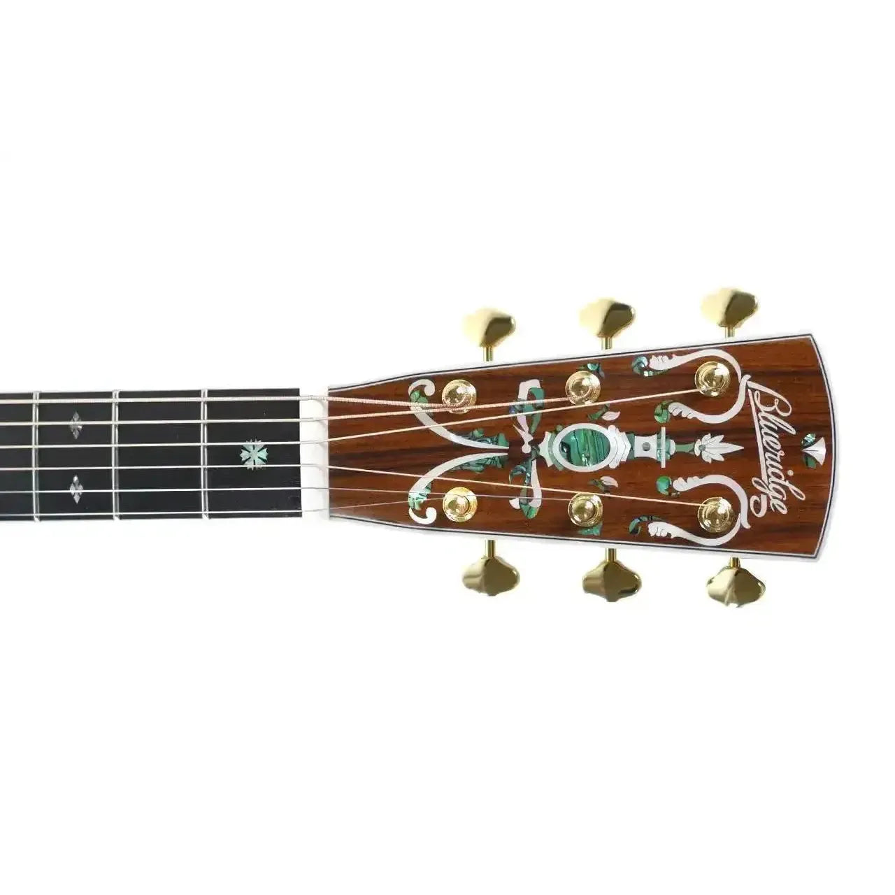 Blueridge BR-183 acoustic guitar headstock with ornate abalone inlay, gold tuners, and ebony fretboard.