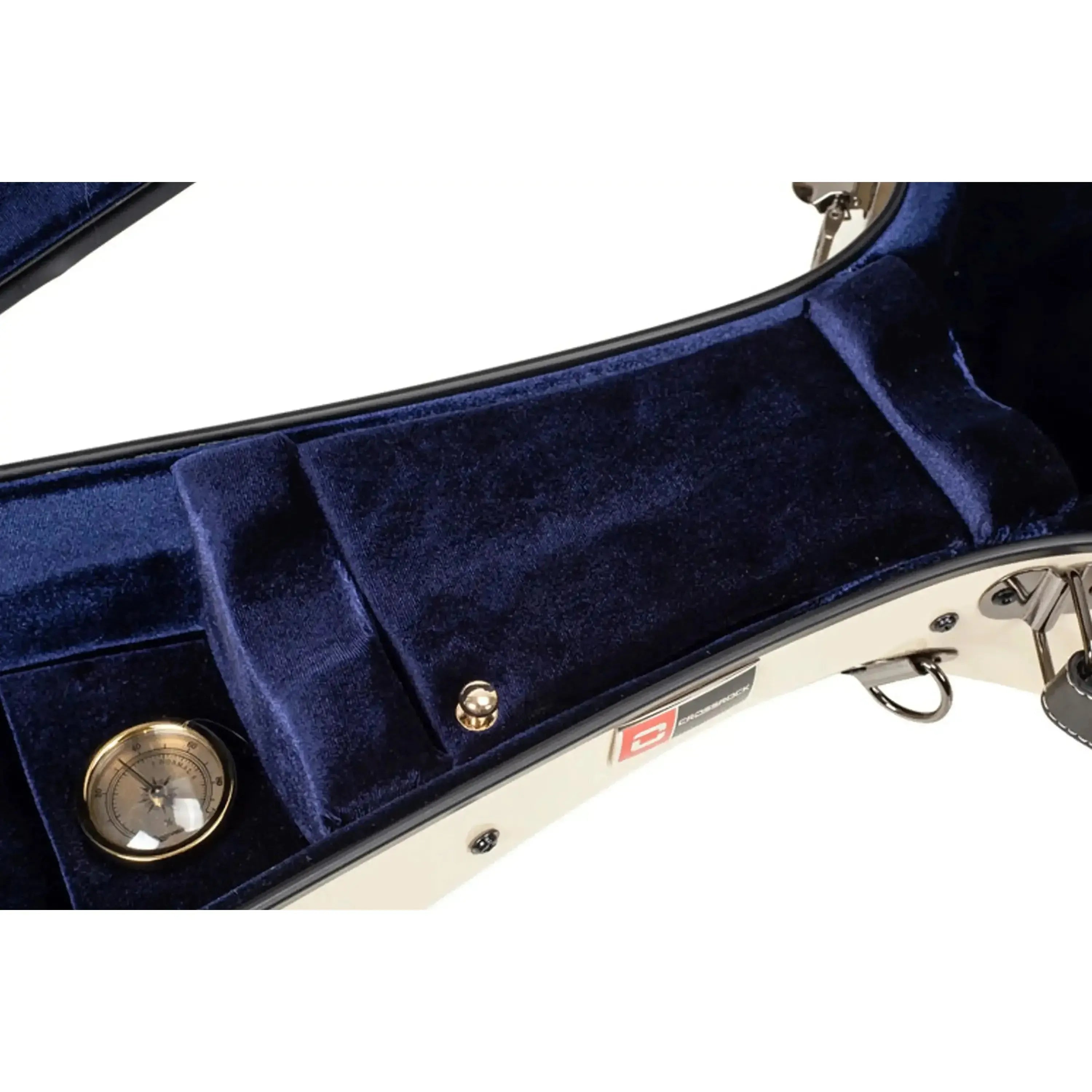 Crossrock CRF2020-0012IV ivory fiberglass acoustic guitar case interior with blue velvet lining and gold hygrometer.