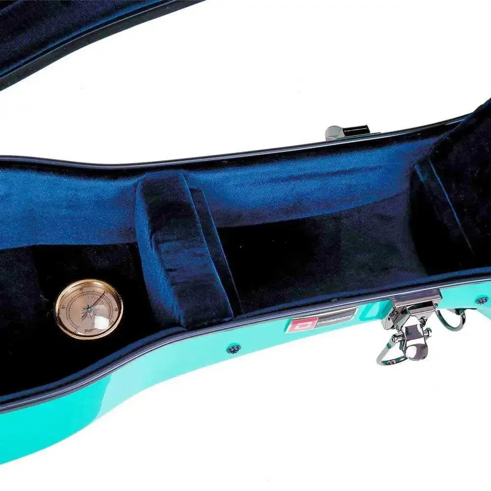 Crossrock CRF2021OMMB mint blue fiberglass acoustic guitar case interior with blue lining, padding, and gold hygrometer.