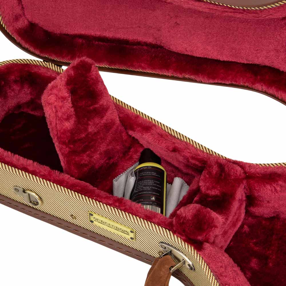 Crossrock CRW720TUFT fabric tweed Master Series wood tenor ukulele case close-up of the open accessory compartment in the burgundy plush interior.