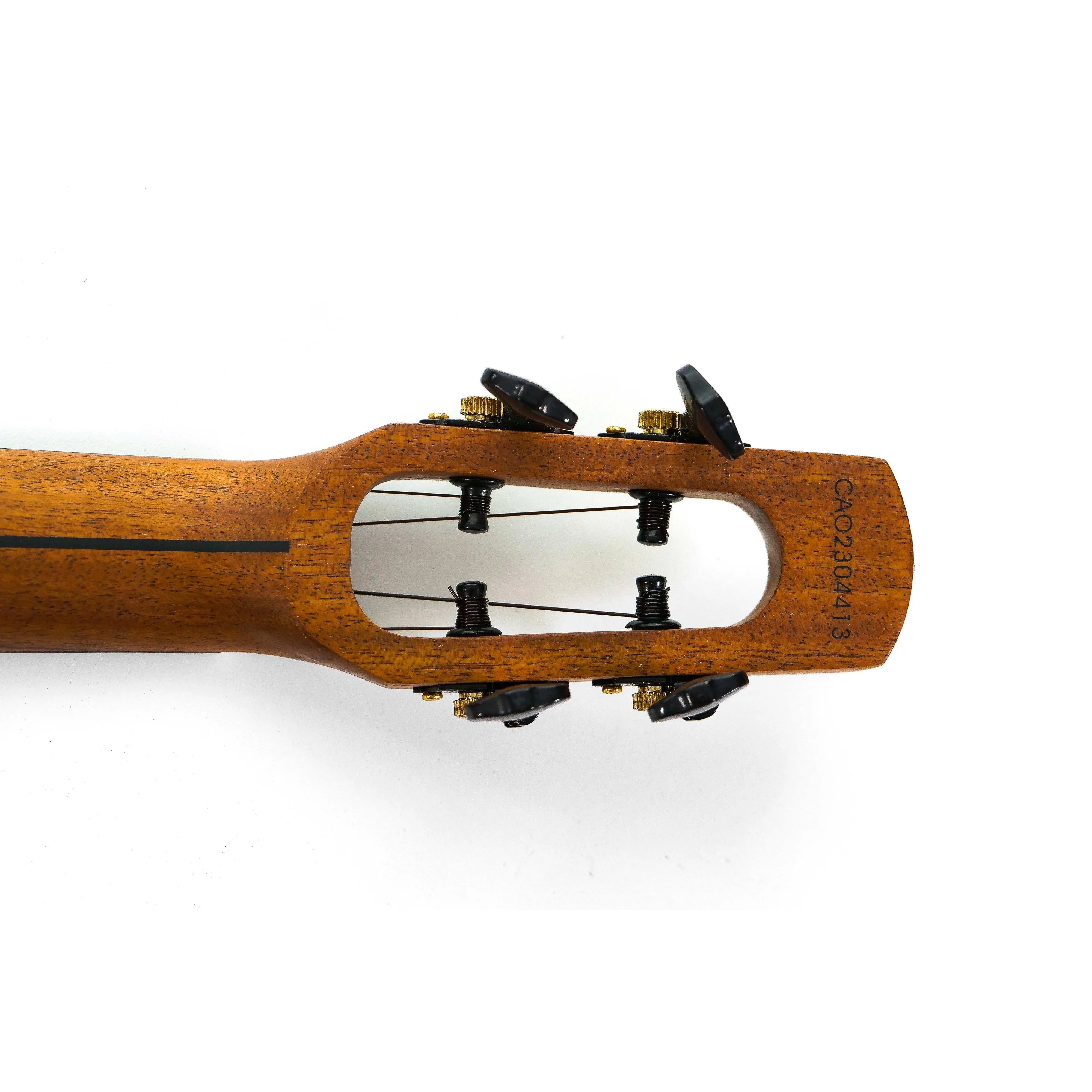 Flight Comet Green Tenor Ukulele headstock with open tuners and serial number.