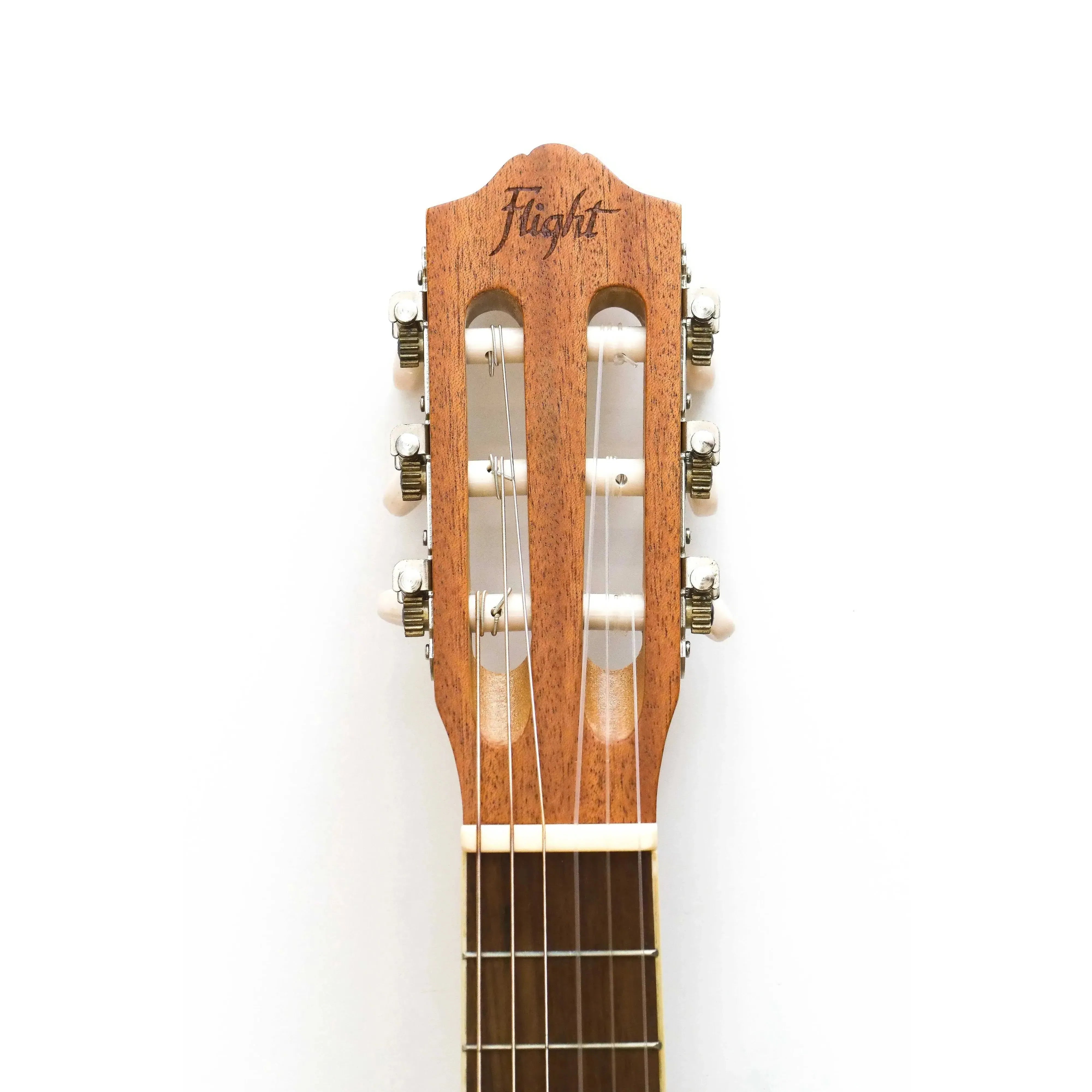 Flight GUT350 SP/SAP Acoustic Guitarlele headstock with ivory and chrome tuners, bone nut, and Flight logo.