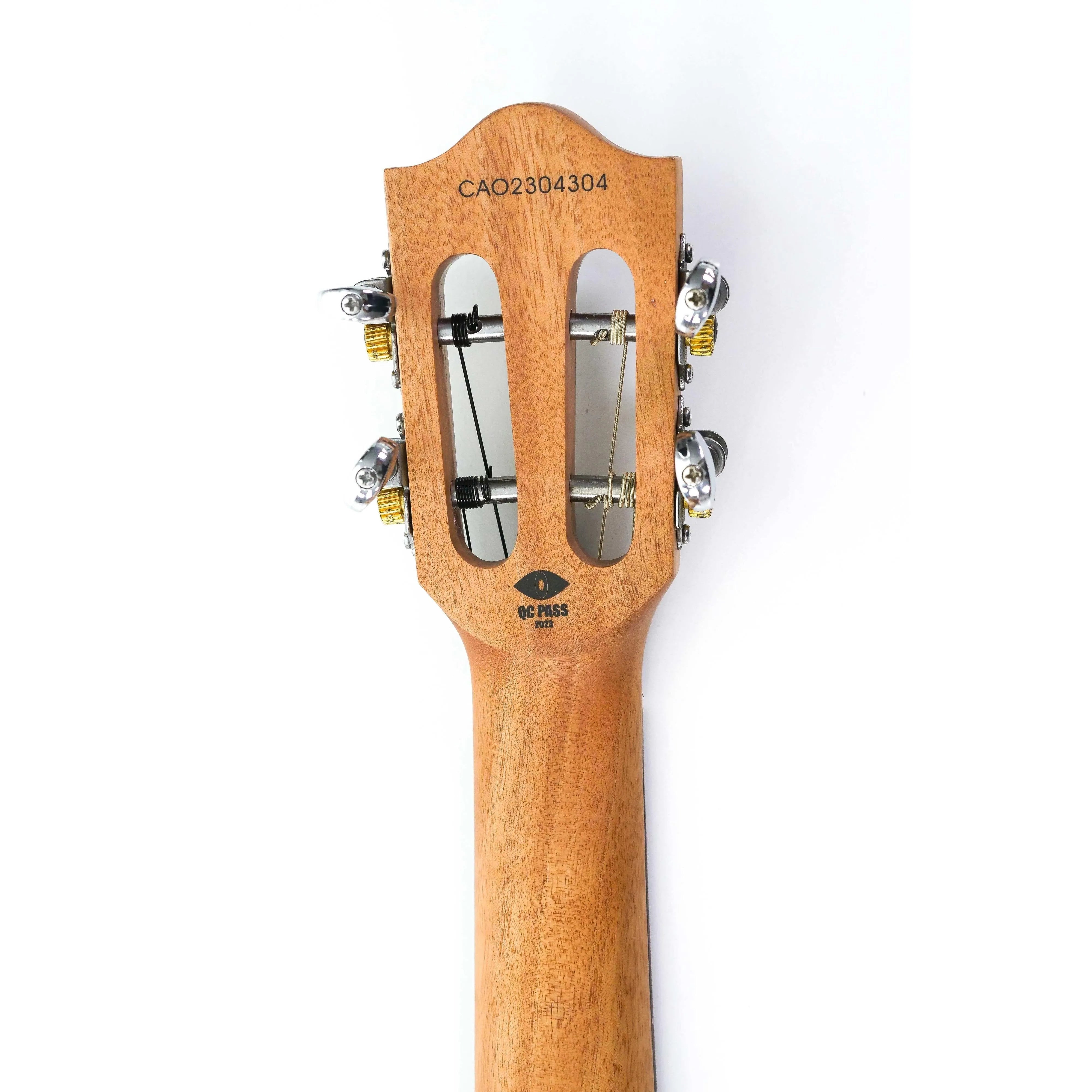 Flight IRIS BK Baritone Ukulele headstock with open-gear tuners and "QC PASS" stamp.