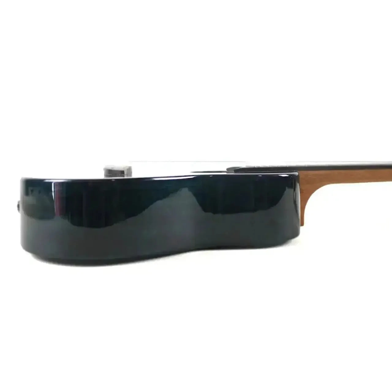 Side view of a Flight IRIS TINTA TDB Transparent Blue Concert Ukulele body with a glossy finish.