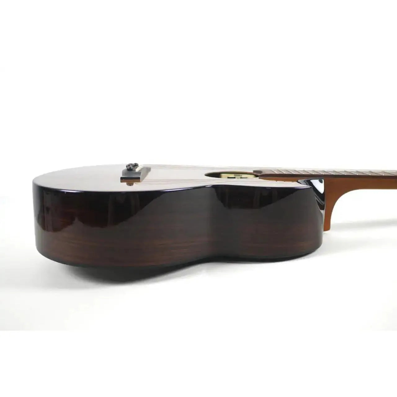 Flight Maia EQ-A Baritone Ukulele with glossy dark wood body, bridge, and neck visible from the side.