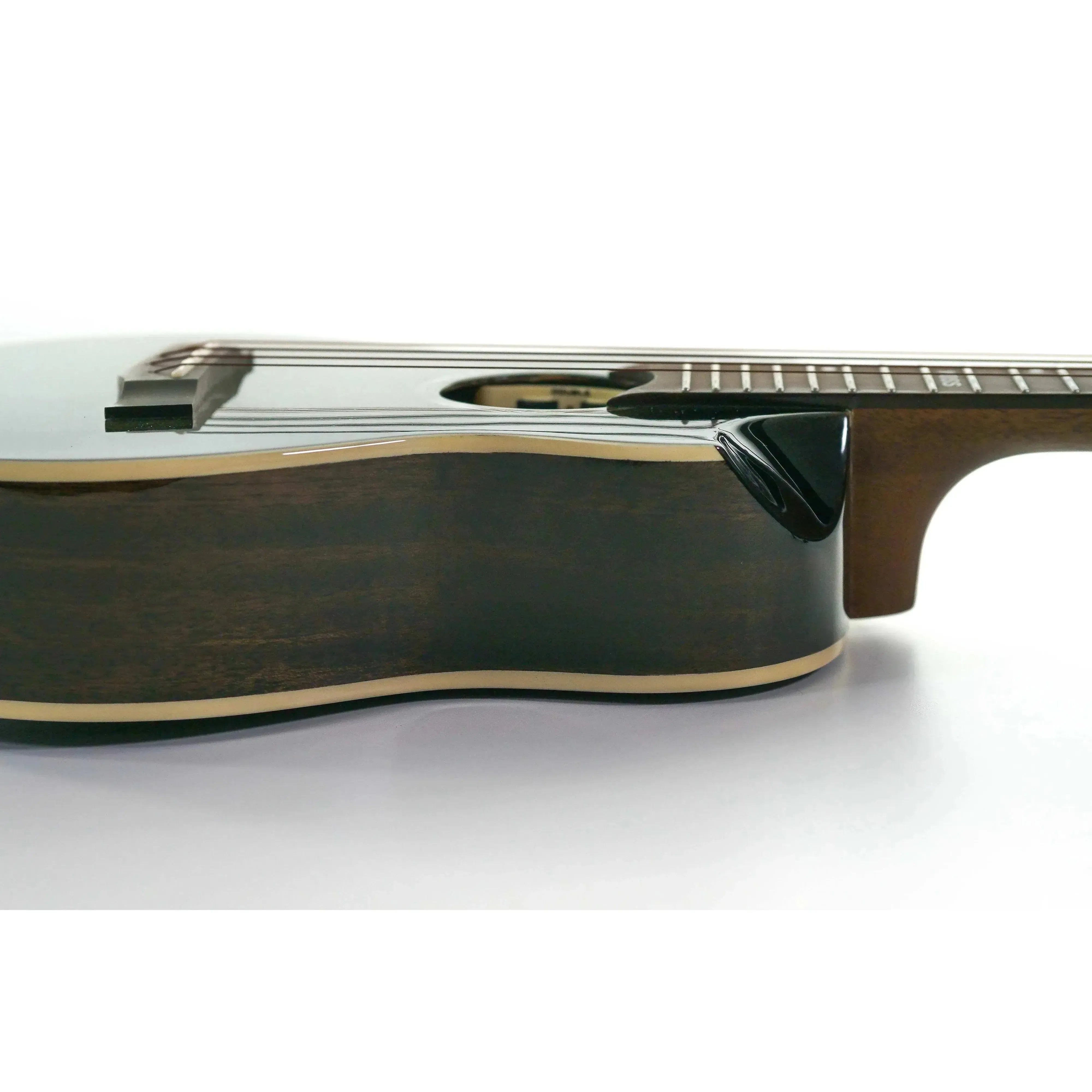 Flight Peter Moss Signature Concert Ukulele with dark wood sides, light spruce top, and scalloped cutaway.