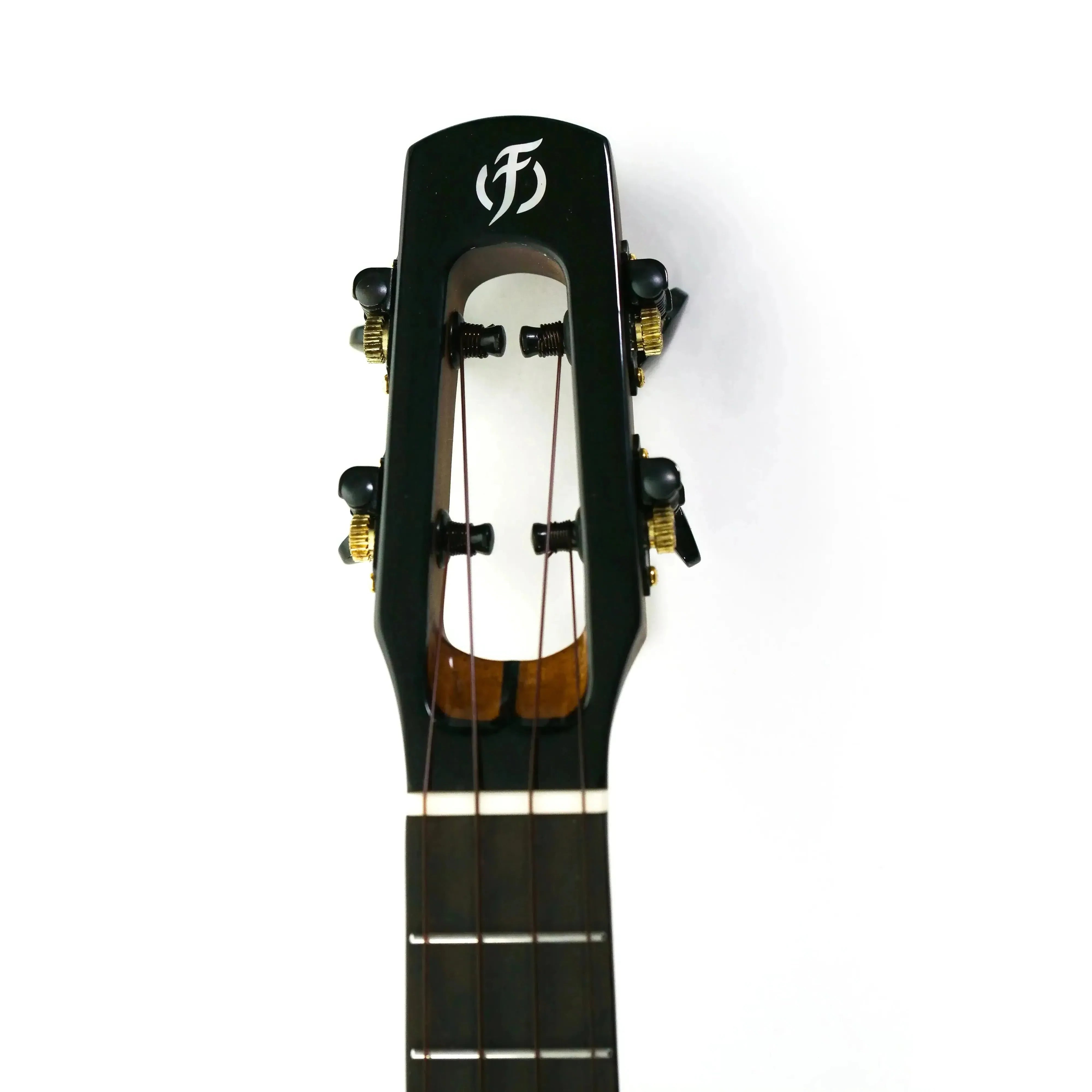 Flight Peter Moss Signature Concert Ukulele headstock with black finish, gold tuners, and white Flight logo.