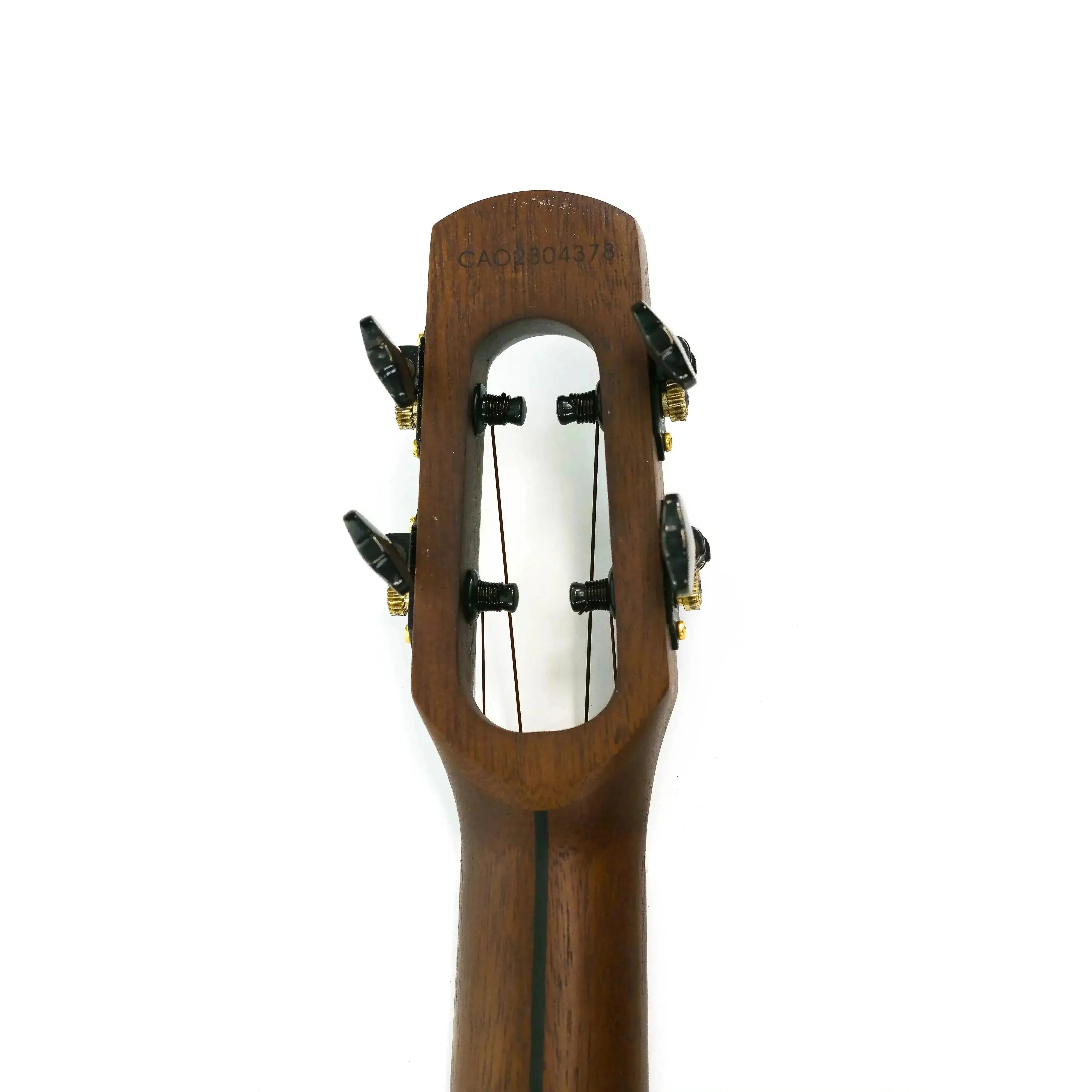 Flight Peter Moss Signature Tenor Ukulele headstock with unique shape, dark wood, and black tuners.