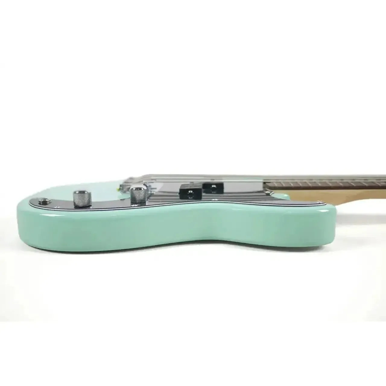 Flight SFG Sea Foam Green Electric Lite Mini Bass, side view showing body, pickups, and controls.