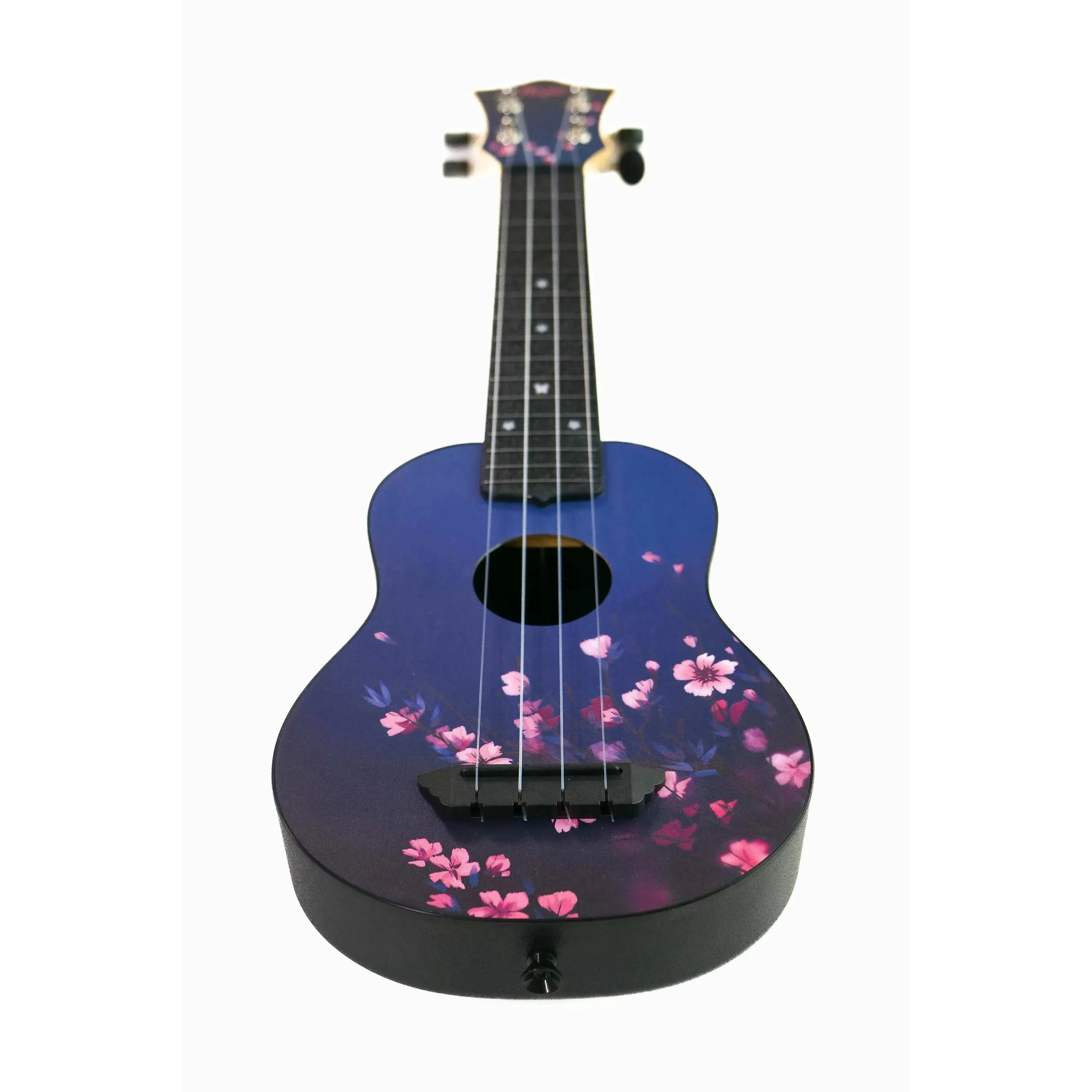 Flight TUS32 Sakura Travel Soprano Ukulele with a blue body and pink cherry blossom print.