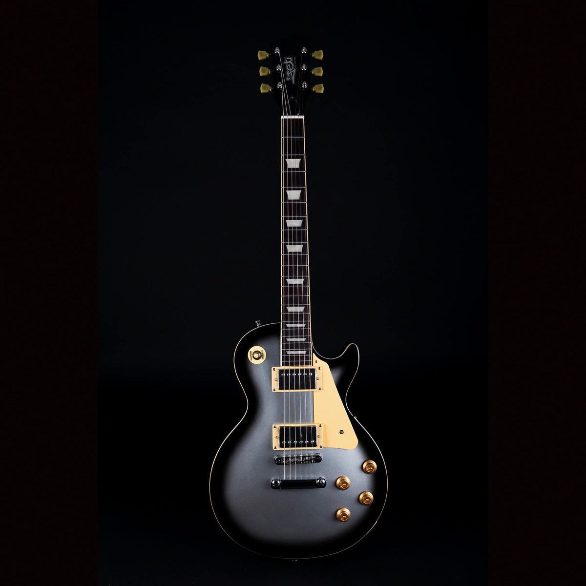 Jet JL-500 SLB Silverburst singlecut electric guitar, full front view with cream pickguard and rosewood fretboard.