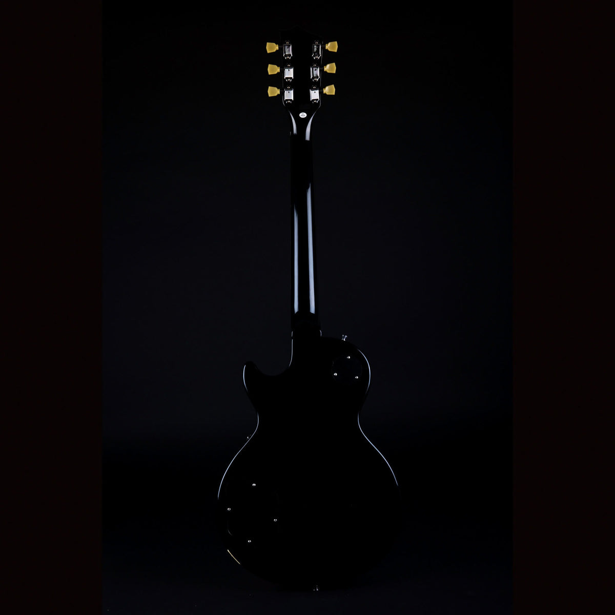 Jet JL-500 SLB singlecut electric guitar, full back view with black finish and gold tuners.