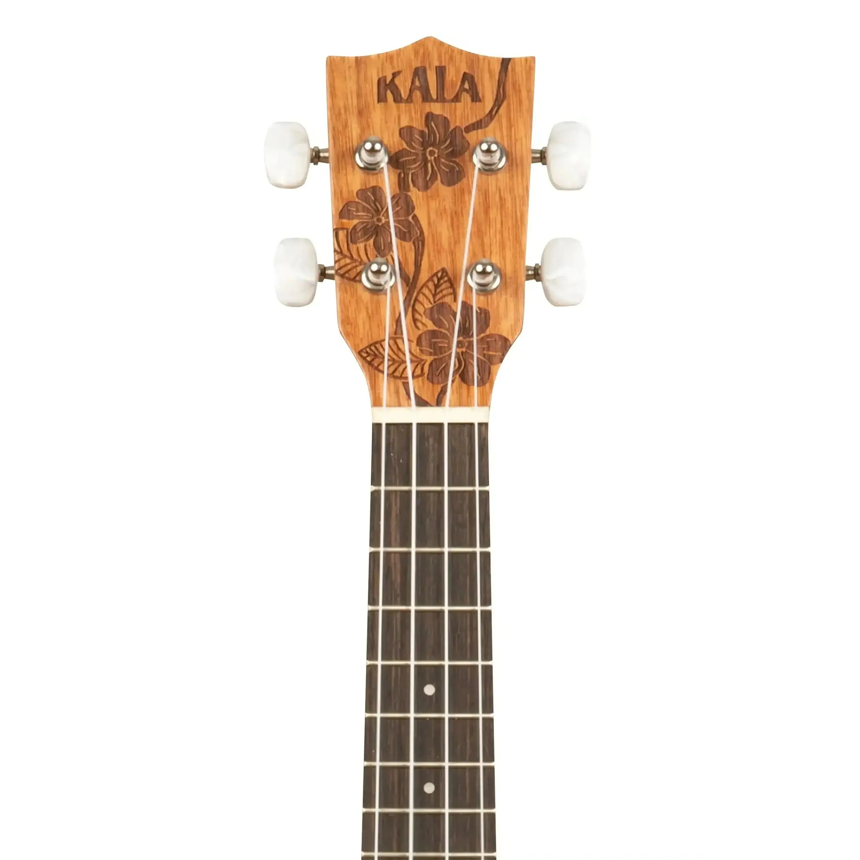 Kala Gardenia mahogany soprano ukulele headstock with floral engraving, white tuners, and rosewood fretboard.
