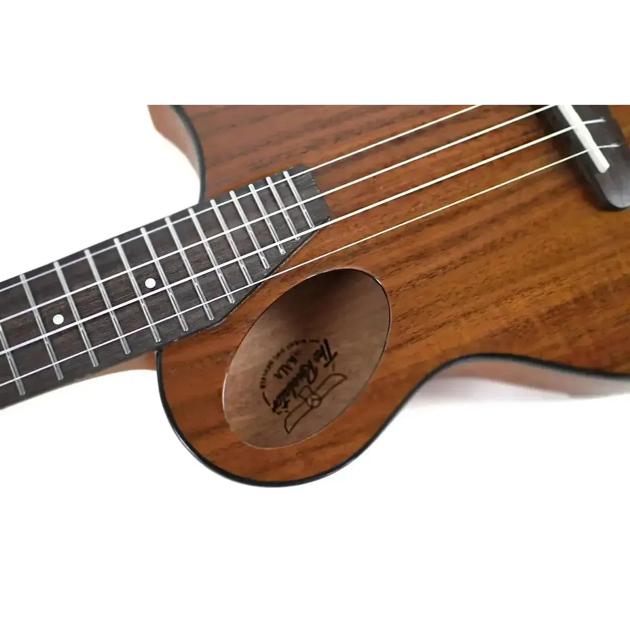 Kala Revelator Night Owl Acacia Tenor Ukulele with Florentine cutaway, soundhole, and fretboard.