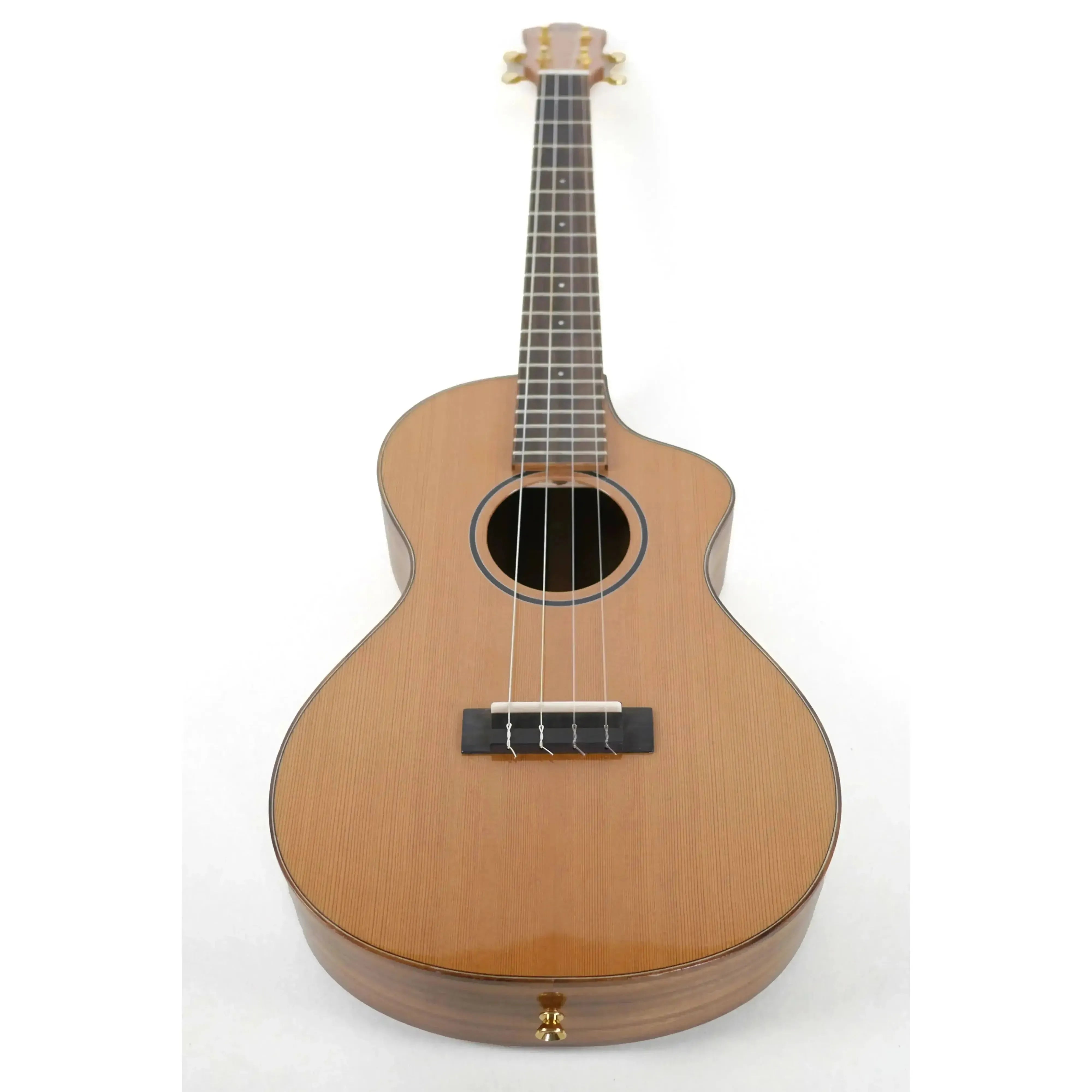 Kala SMP-B-C Trembesi Baritone Ukulele with solid cedar top, glossy finish, and gold strap button.