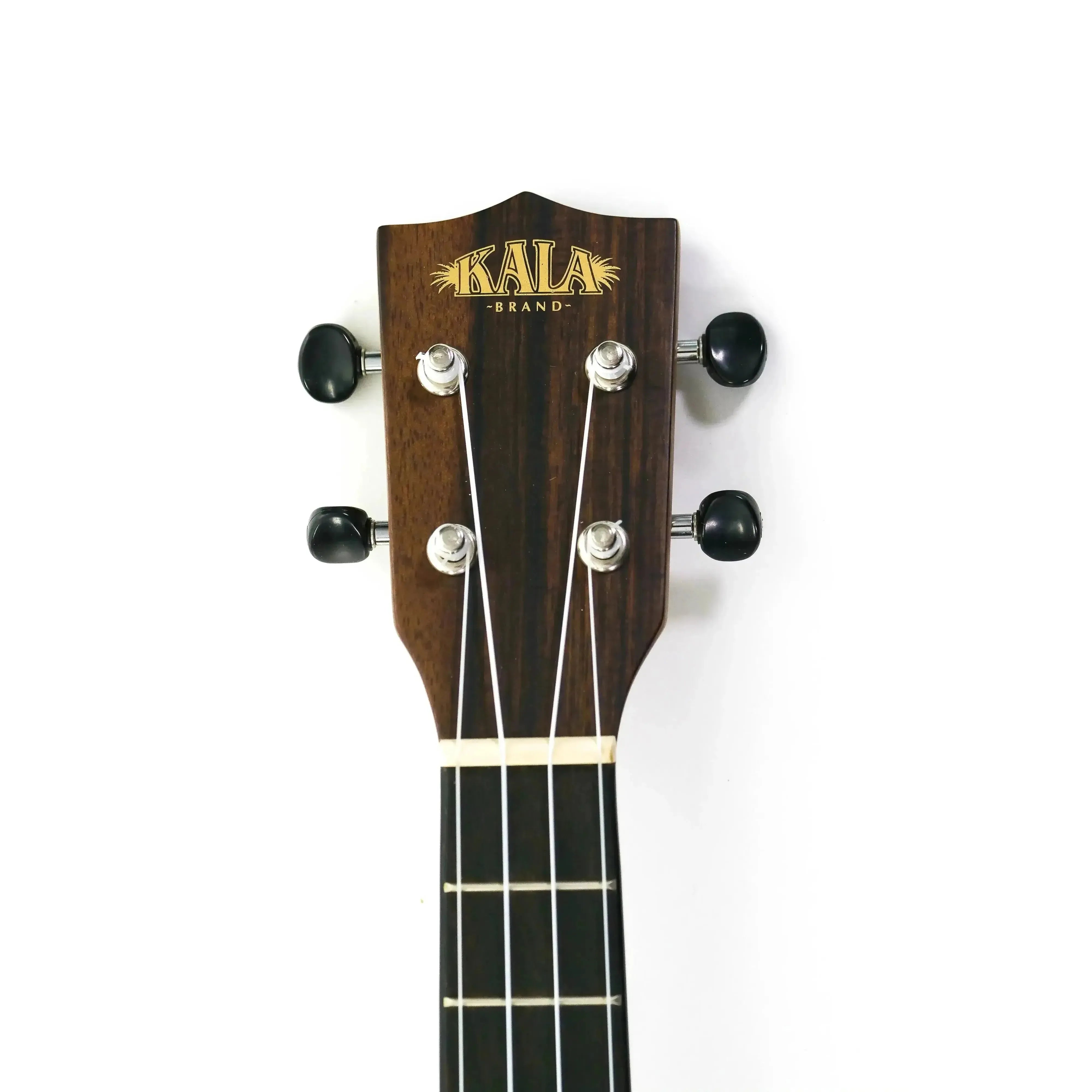 Kala Tenor Ukulele headstock with dark wood, gold logo, black tuning pegs, and white strings.